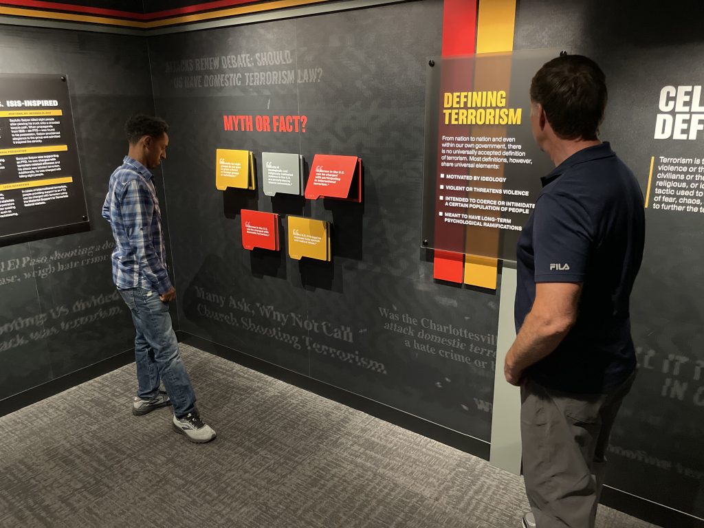 CELL patrons viewing a section of the CELL exhibit