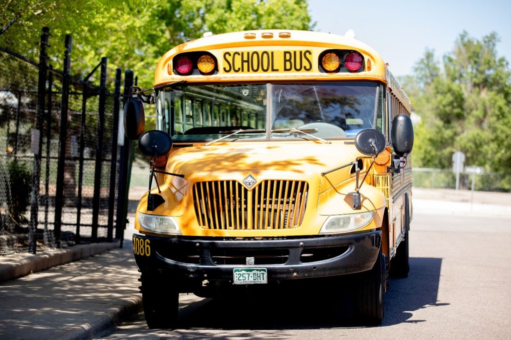 Classic yellow school bus with Colorado license plate